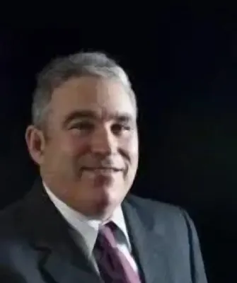 Mark J. Shmueli